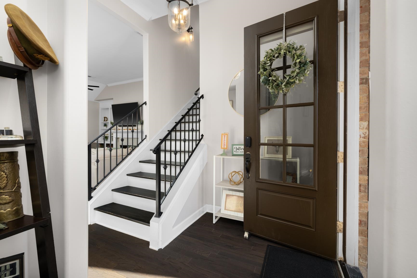 235 Misty Fields Road Oakland, TN 38060 - Photo 5 of 40 Entryway with ornamental molding, dark wood-style floors, and stairs