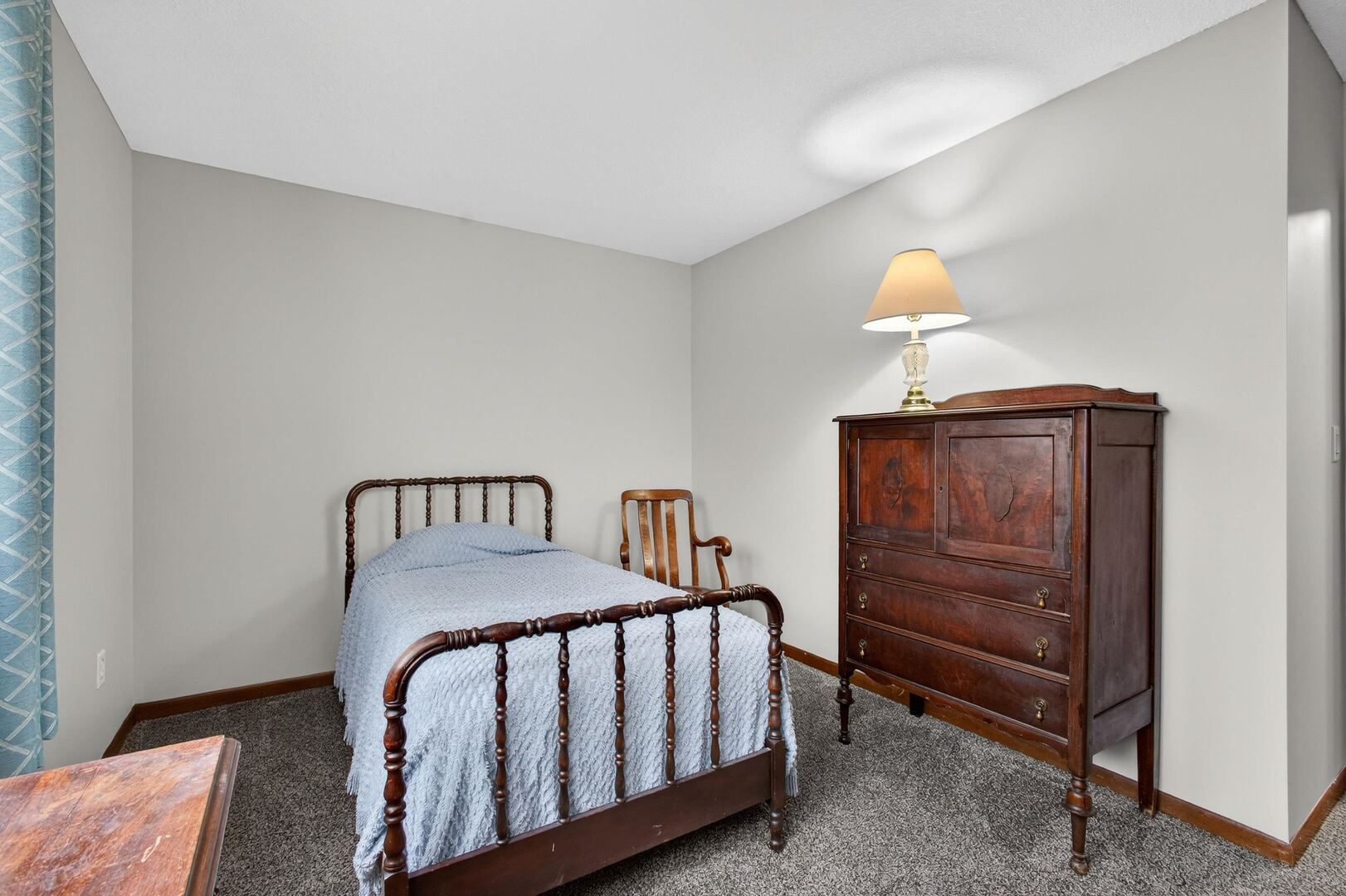 800 East Iowa Street, Unit 2C Eldridge, IA 52748 - Photo 19 of 28 a bedroom with a bed and a table