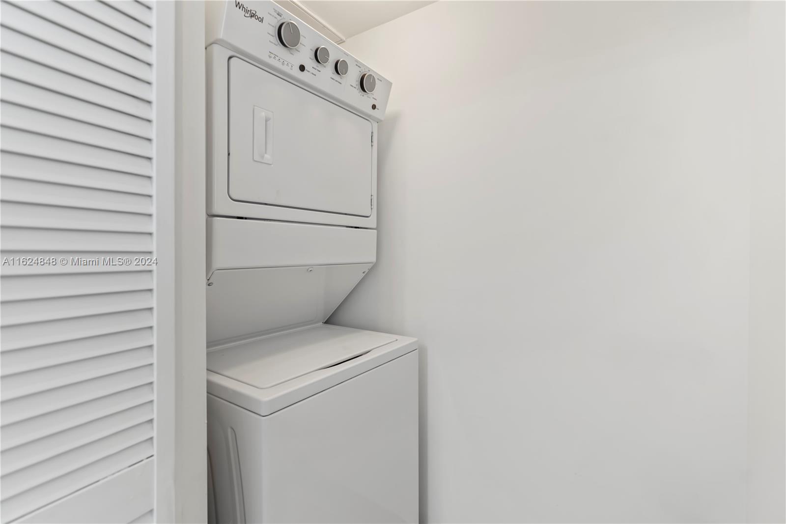 4250 Biscayne Boulevard, Unit 1018 Miami, FL 33137 - Photo 20 of 54 a utility room with dryer and washer