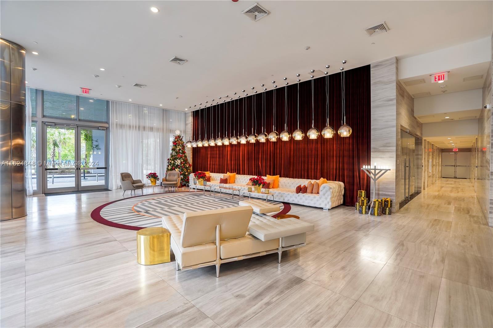 4250 Biscayne Boulevard, Unit 1018 Miami, FL 33137 - Photo 27 of 54 a view of a room with wooden floor and furniture