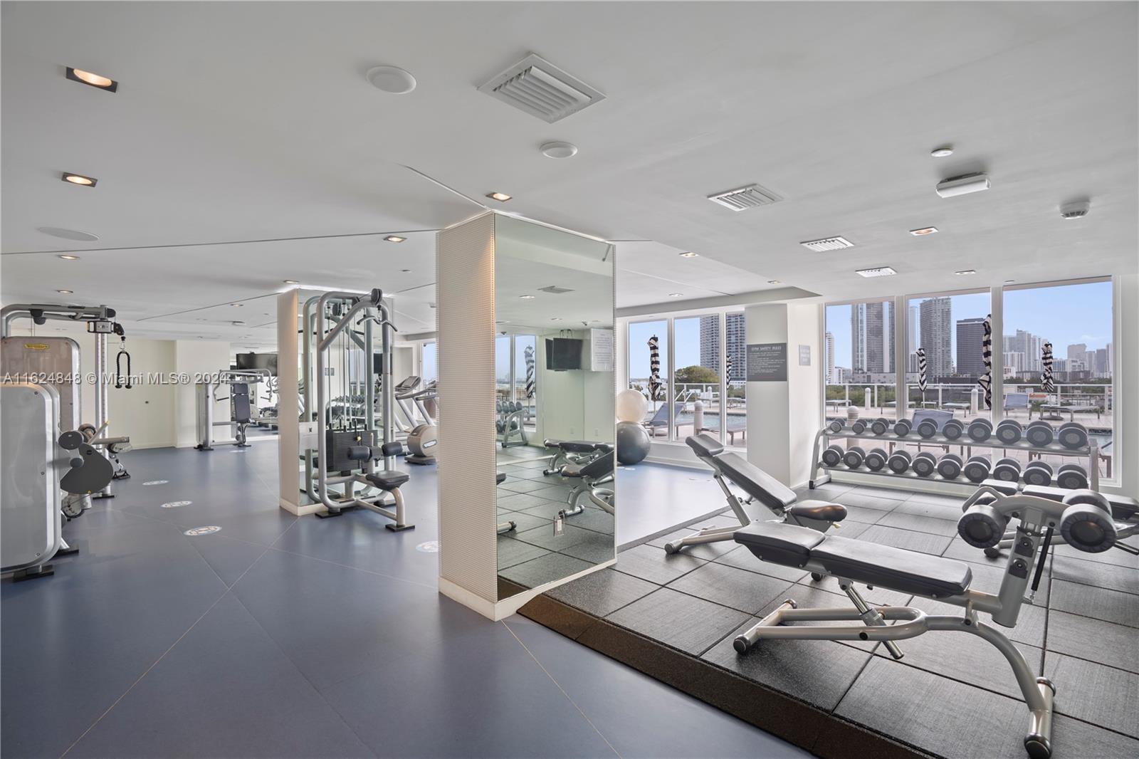 4250 Biscayne Boulevard, Unit 1018 Miami, FL 33137 - Photo 46 of 54 a view of a room with gym equipment