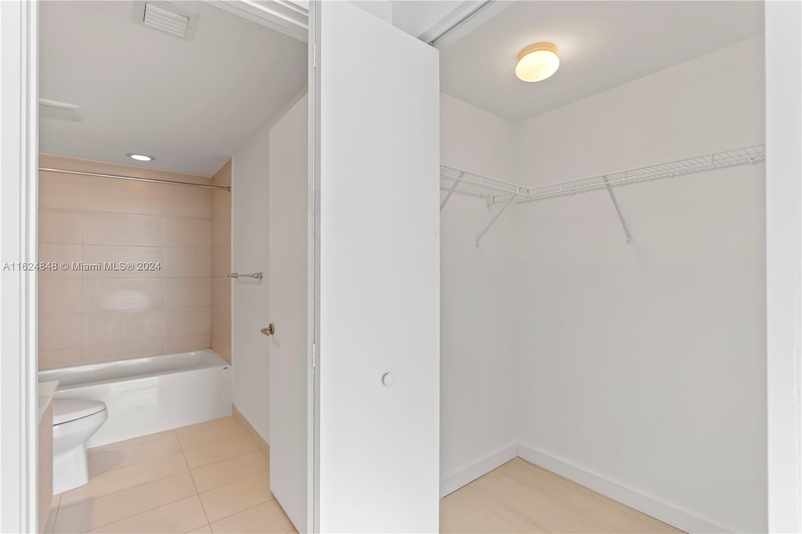 4250 Biscayne Boulevard, Unit 1018 Miami, FL 33137 - Photo 54 of 54 a bathroom with a shower