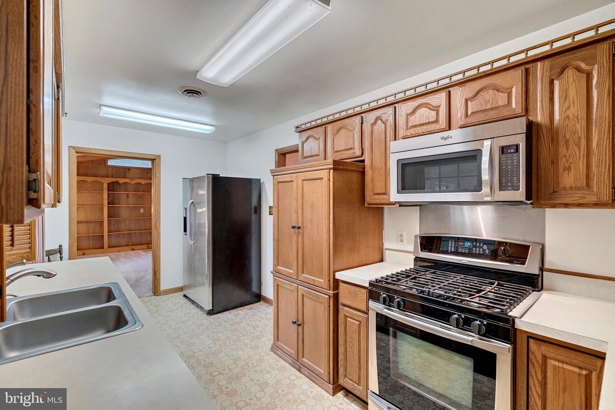 16474 Oak Shade Road Rixeyville, VA 22737 - Photo 11 of 29 Galley Style Kitchen with Stainless Steel