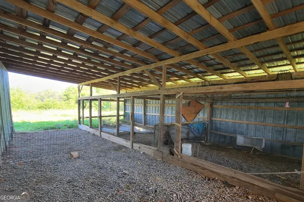 a view of a room with wooden deck