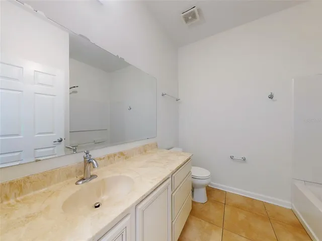 a close view of a bathtub in a bathroom