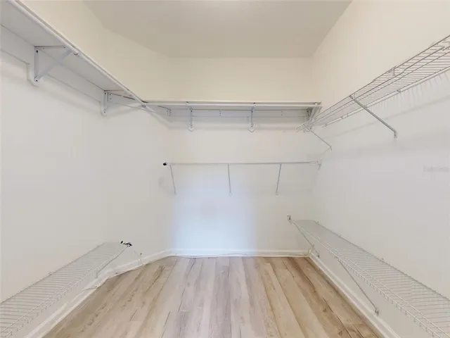 a view of an empty walk in closet