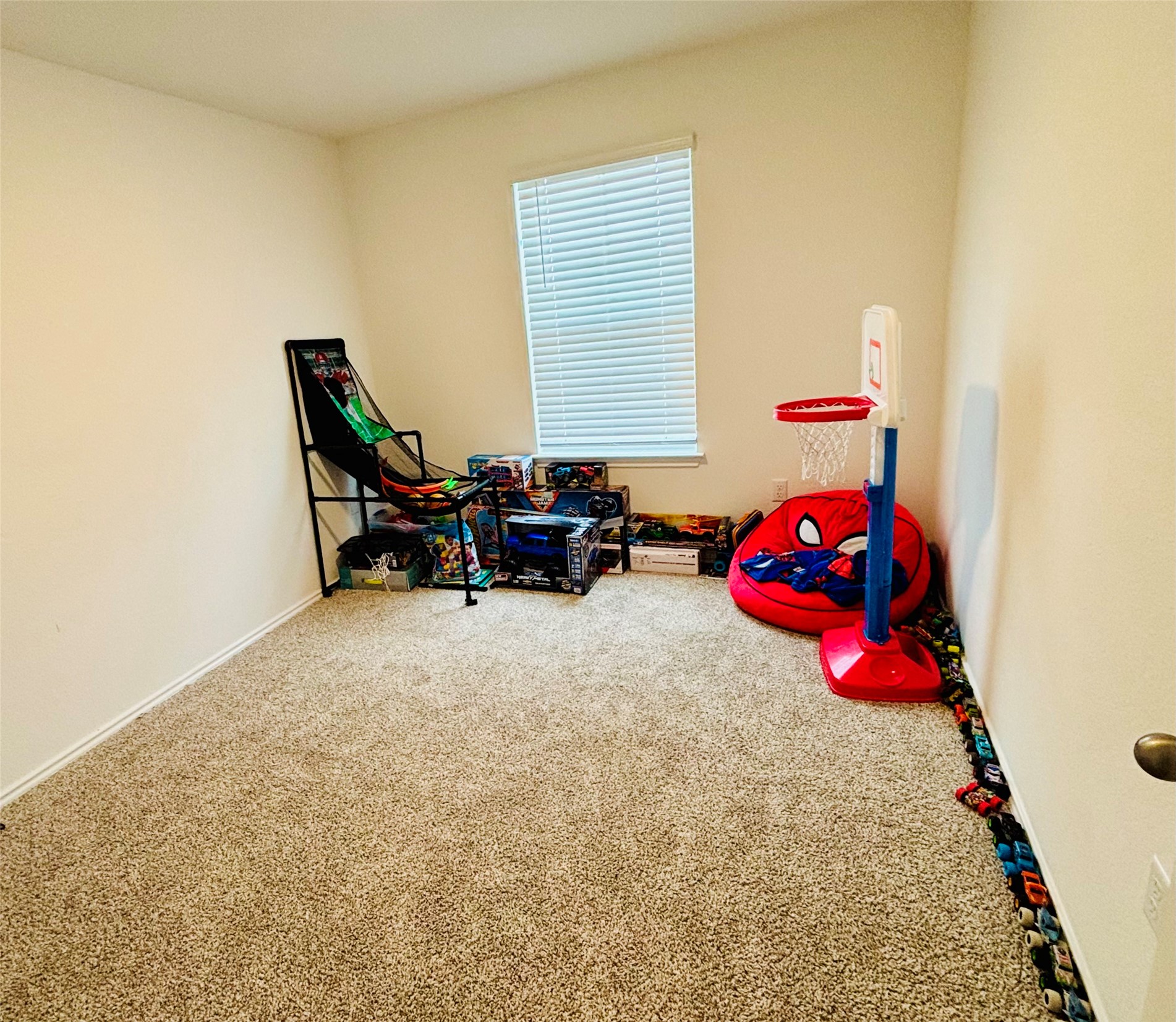14817 Perlino Way, Unit A Manor, TX 78653 - Photo 14 of 40 a bedroom with furniture and a bed