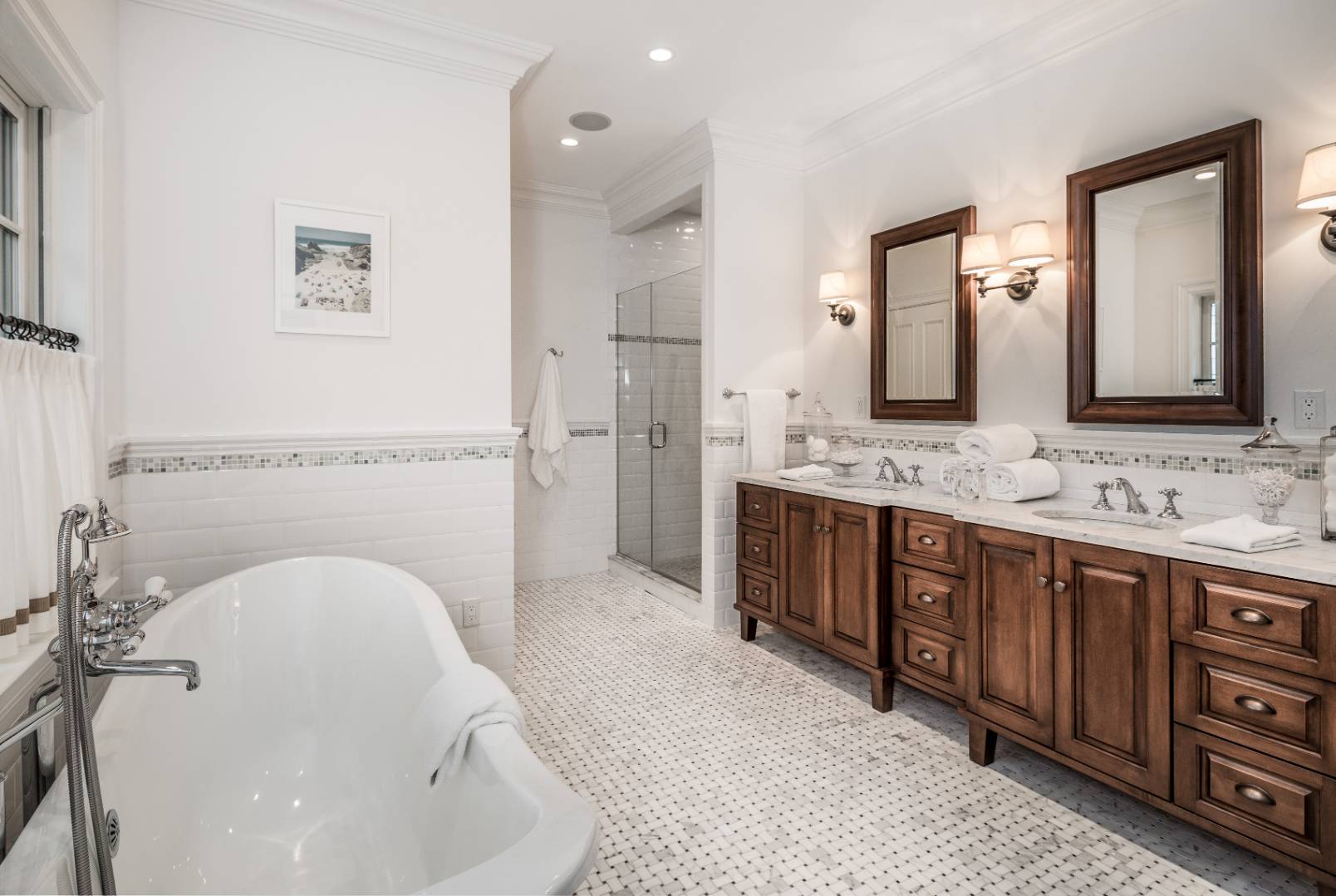 933 Cobb Road West Water Mill, NY 11976 - Photo 18 of 26 a spacious bathroom with a double vanity sink a mirror and a bathtub