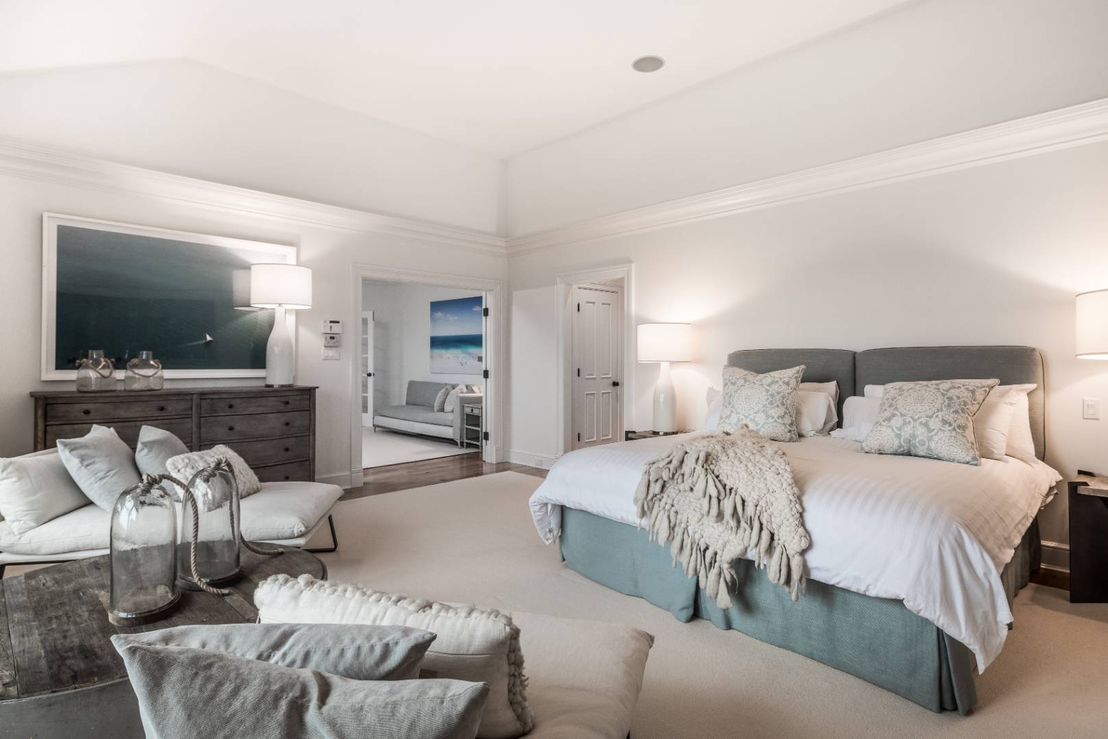 933 Cobb Road West Water Mill, NY 11976 - Photo 19 of 26 a spacious bedroom with a bed and couch
