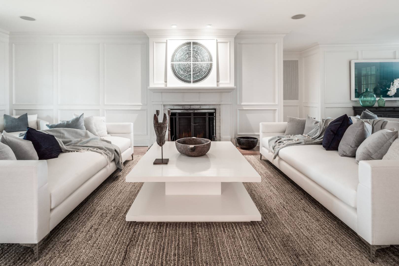 933 Cobb Road West Water Mill, NY 11976 - Photo 10 of 26 a living room with furniture a fireplace and a flat screen tv