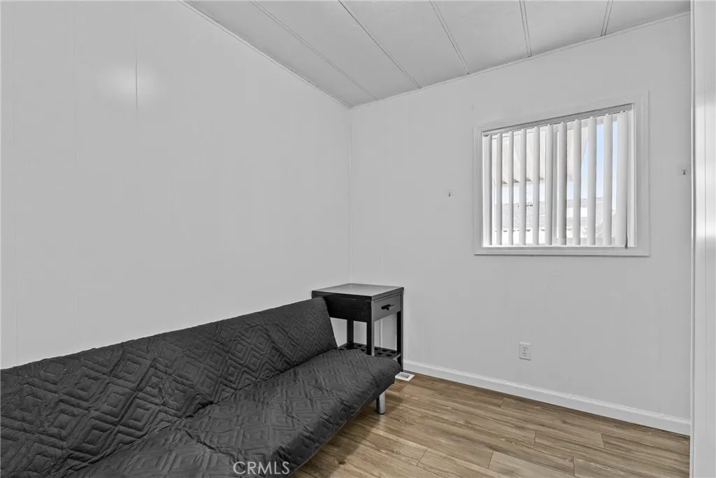 4000 Pierce Street, Unit 132 Riverside, CA 92505 - Photo 22 of 43 a living room with furniture and a window