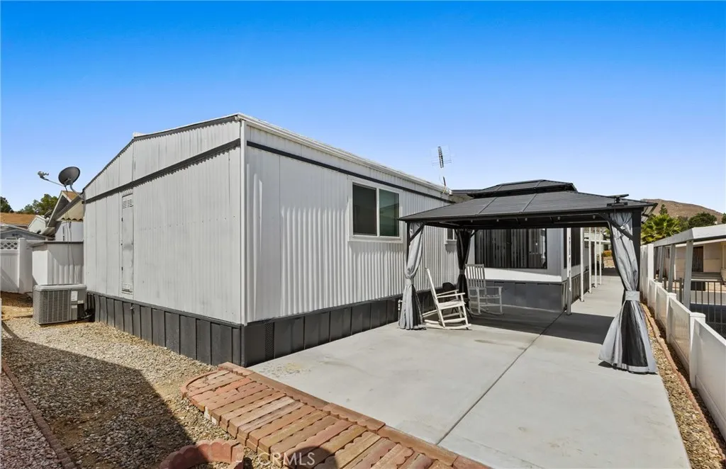 4000 Pierce Street, Unit 132 Riverside, CA 92505 - Photo 30 of 43 a house view with a backyard space
