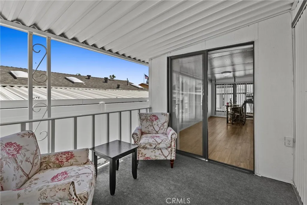 4000 Pierce Street, Unit 132 Riverside, CA 92505 - Photo 6 of 43 a bedroom with furniture and a window