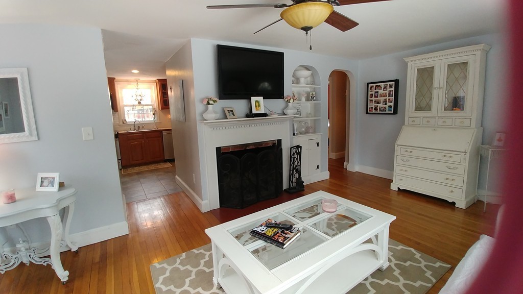 2 Jackson Road Scituate, MA 02066 - Photo 3 of 13 a living room with furniture and a flat screen tv