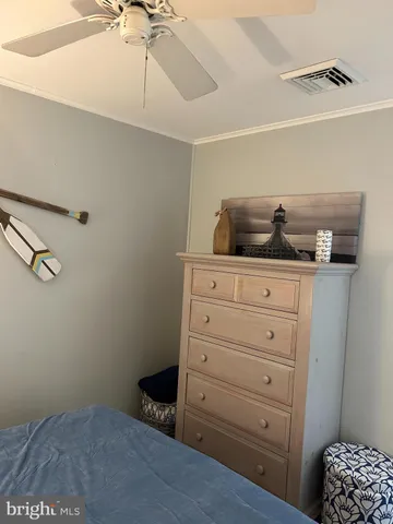 a kitchen with a cabinets and window