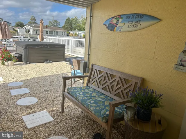 a view of a living room and a balcony