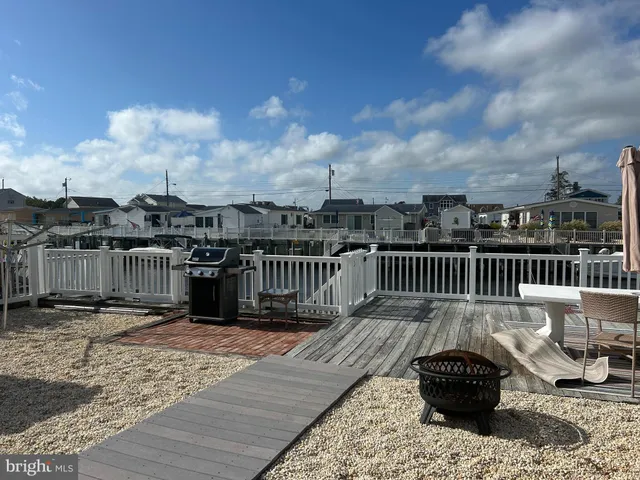 a view of balcony with wooden floor
