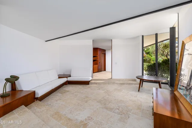 a living room with a large window