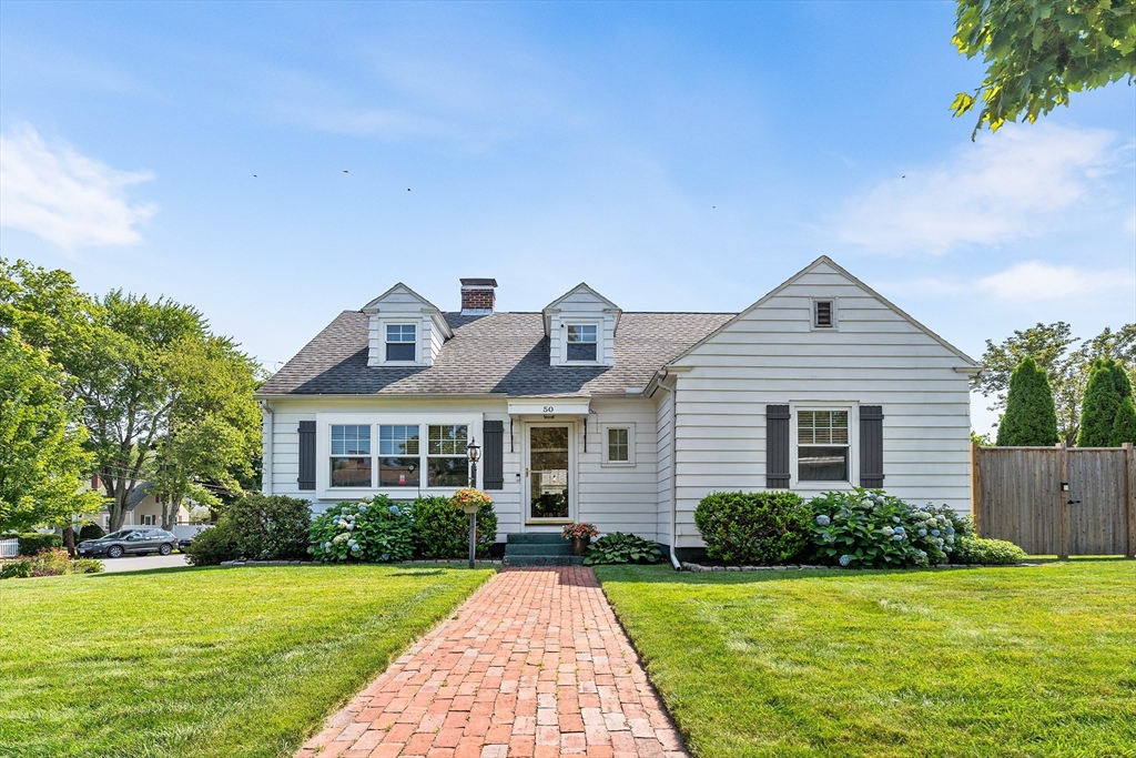 50 Durso Avenue Lawrence, MA 01843 - Photo 1 of 38 a front view of a house with a yard