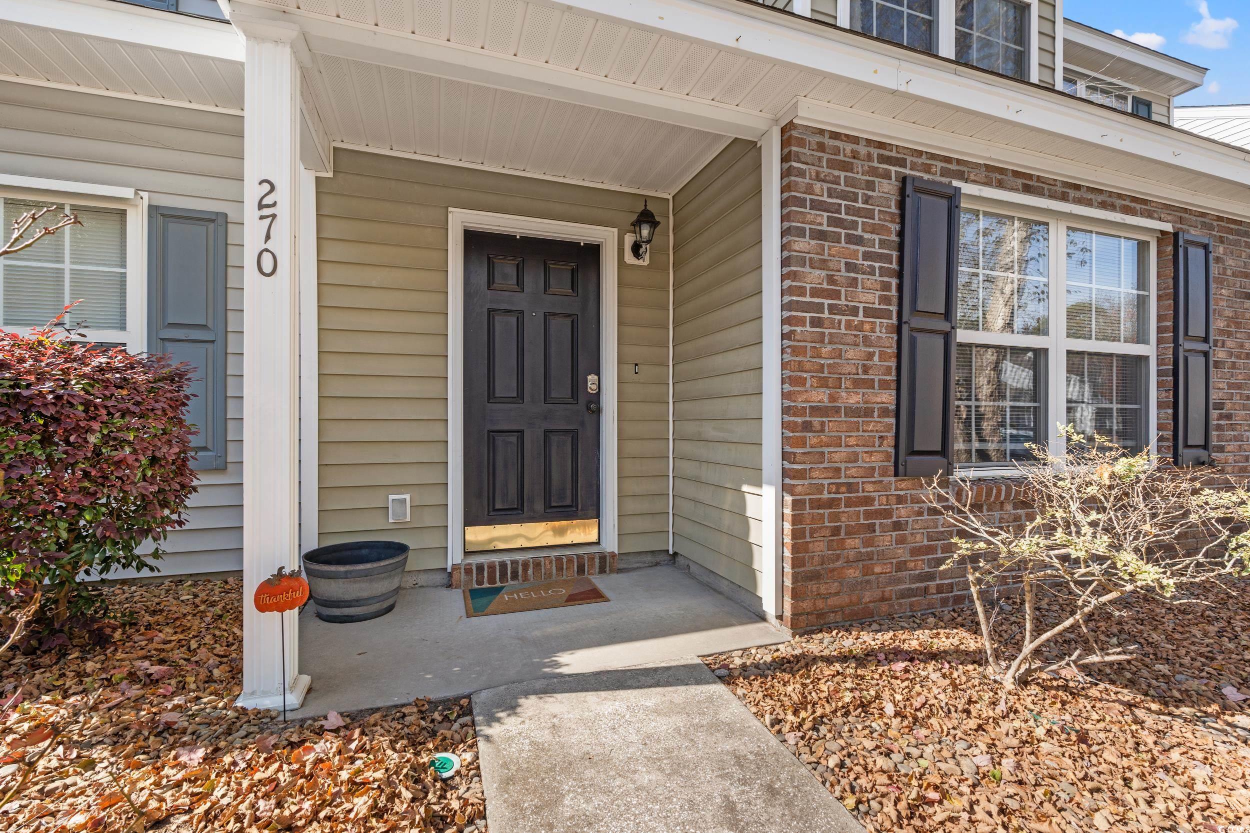 270 Seabert Road, Unit 270 Myrtle Beach, SC 29579 - Photo 20 of 31 Full bathroom featuring a shower with shower curtain, vanity, and dark tile patterned flooring