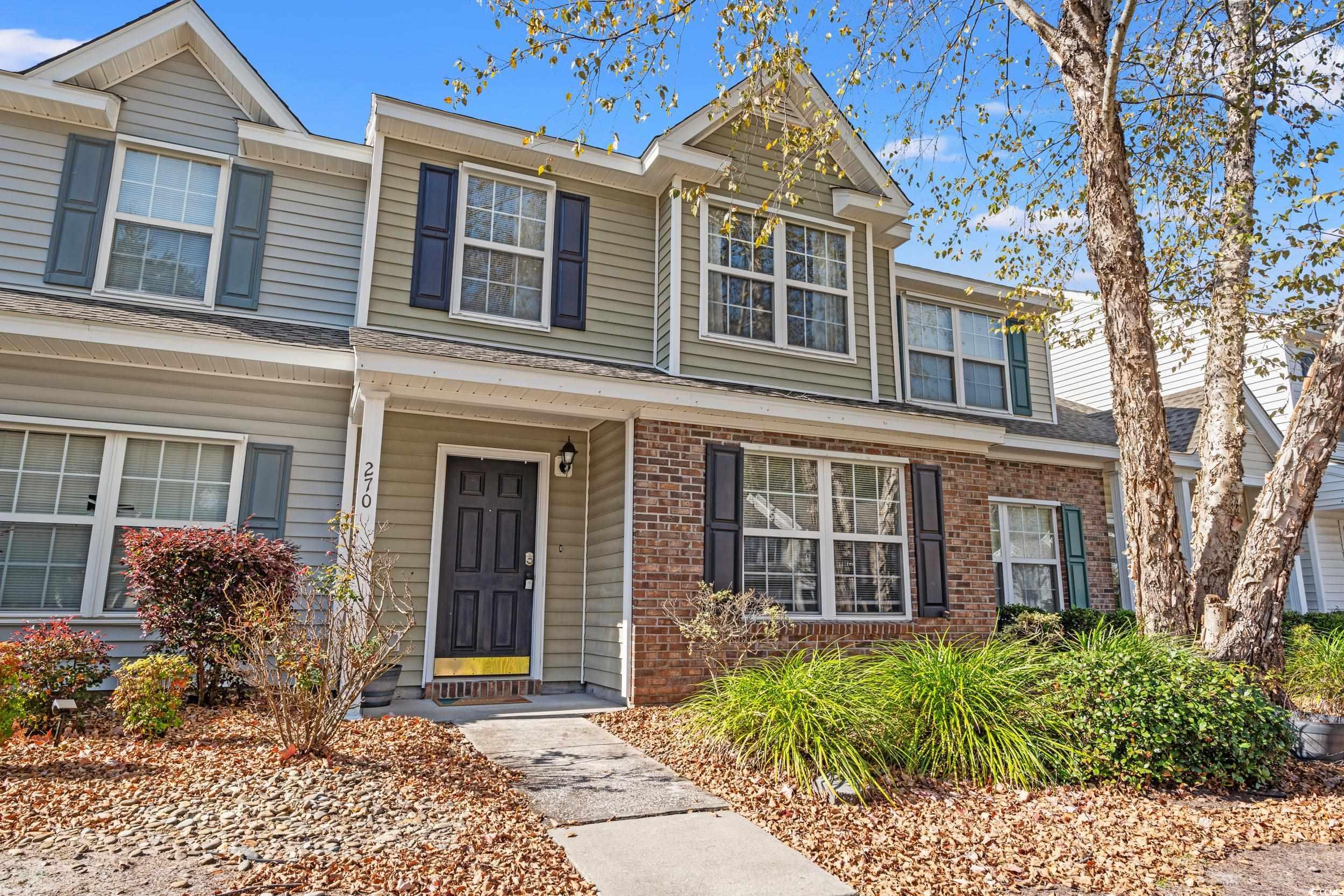 270 Seabert Road, Unit 270 Myrtle Beach, SC 29579 - Photo 25 of 31 View of front of property with uncovered parking and brick siding