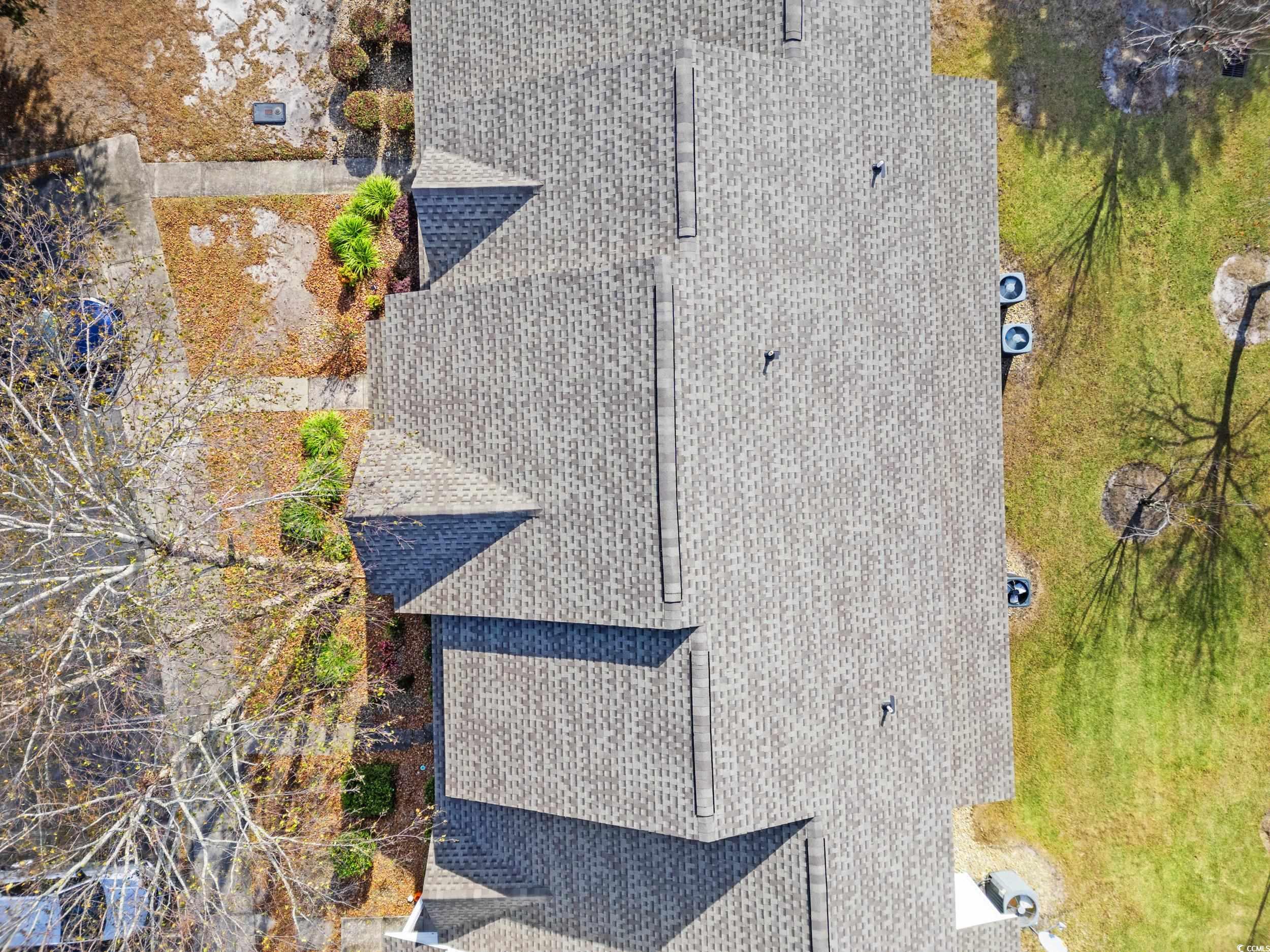 270 Seabert Road, Unit 270 Myrtle Beach, SC 29579 - Photo 27 of 31 View of side of property with a yard