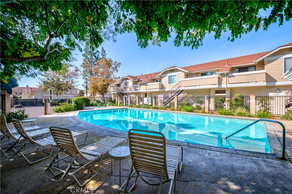 12671 Briarglen Loop, Unit G Stanton, CA 90680 - Photo 24 of 24 a view of a chairs and table in the patio