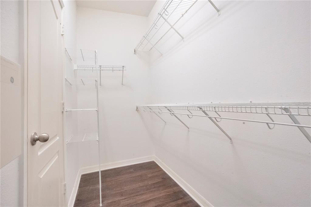 15031 Skip Jack Loop Lakewood Ranch, FL 34202 - Photo 16 of 27 a view of a room with racks on the wall