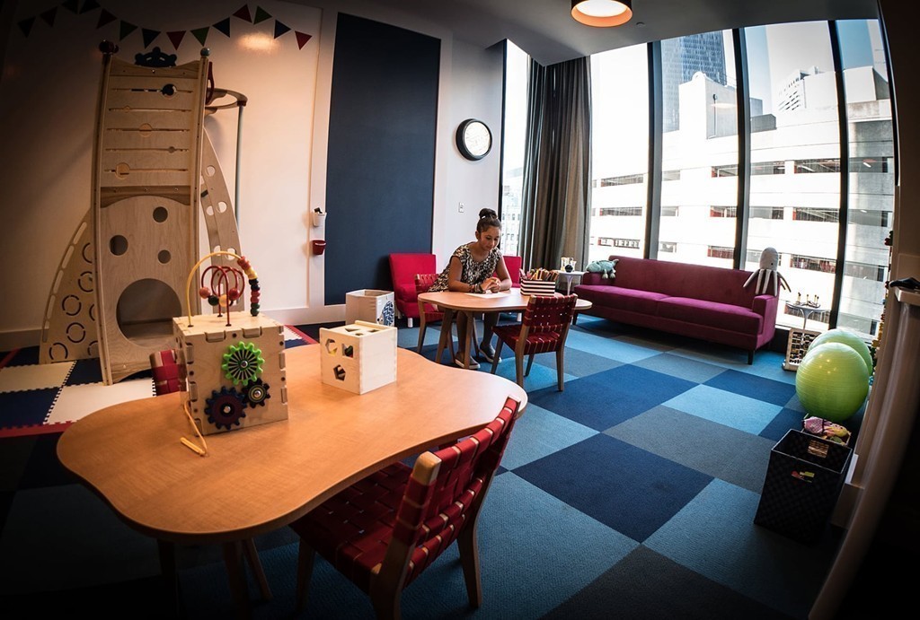 1 Franklin Street, Unit PH 2D Boston, MA 02110 - Photo 26 of 26 a dining room with furniture and a large window