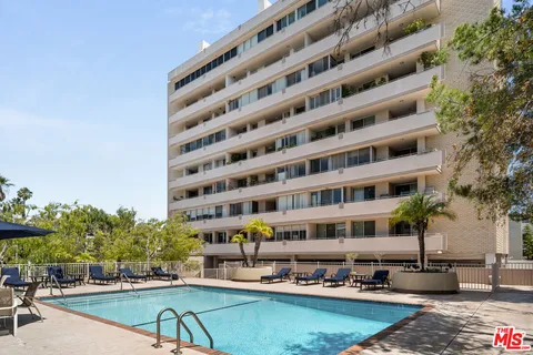 a kitchen with stainless steel appliances lots of counter top space