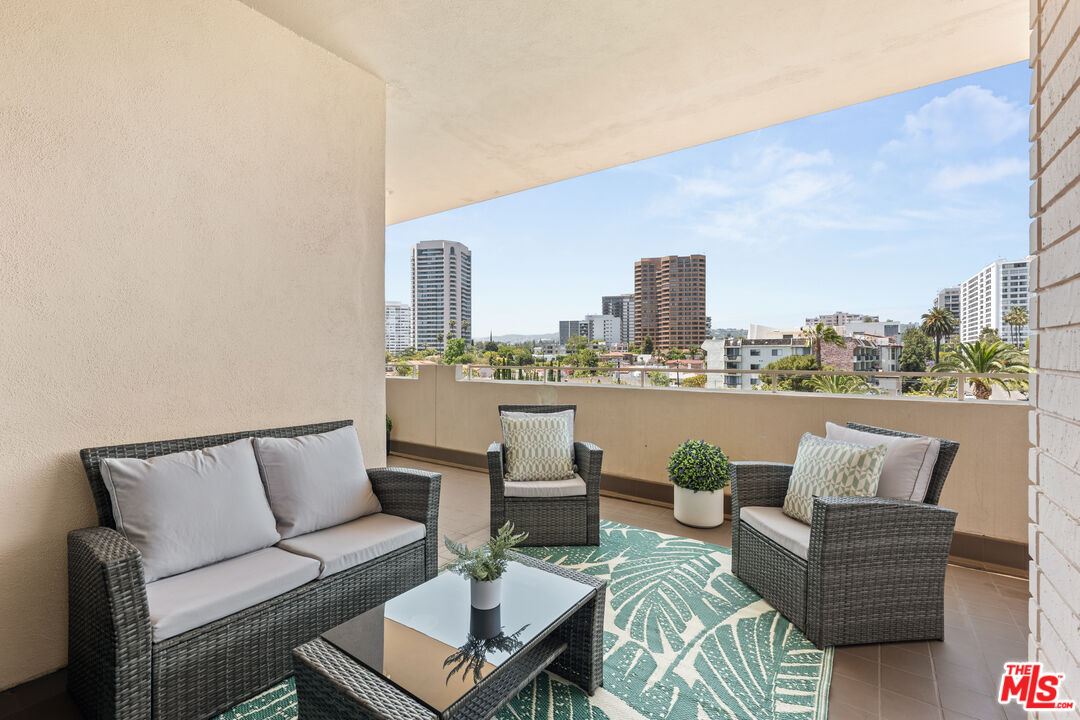 1333 South Beverly Glen Boulevard, Unit 703 Los Angeles, CA 90024 - Photo 3 of 18 a view of a terrace with couches