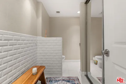 a bathroom with a sink and a shower