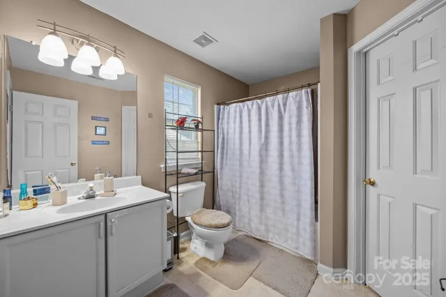 $380,000 | 14310 Tapestry Woods Court, Charlotte, NC 28273