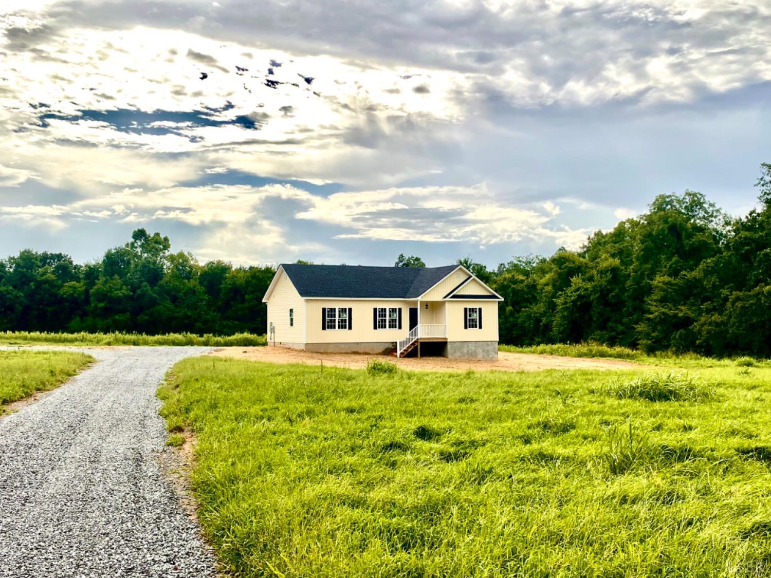 4922 Worsham Road Green Bay, VA 23942 - Photo 1 of 15 a front view of a house with yard and lake view
