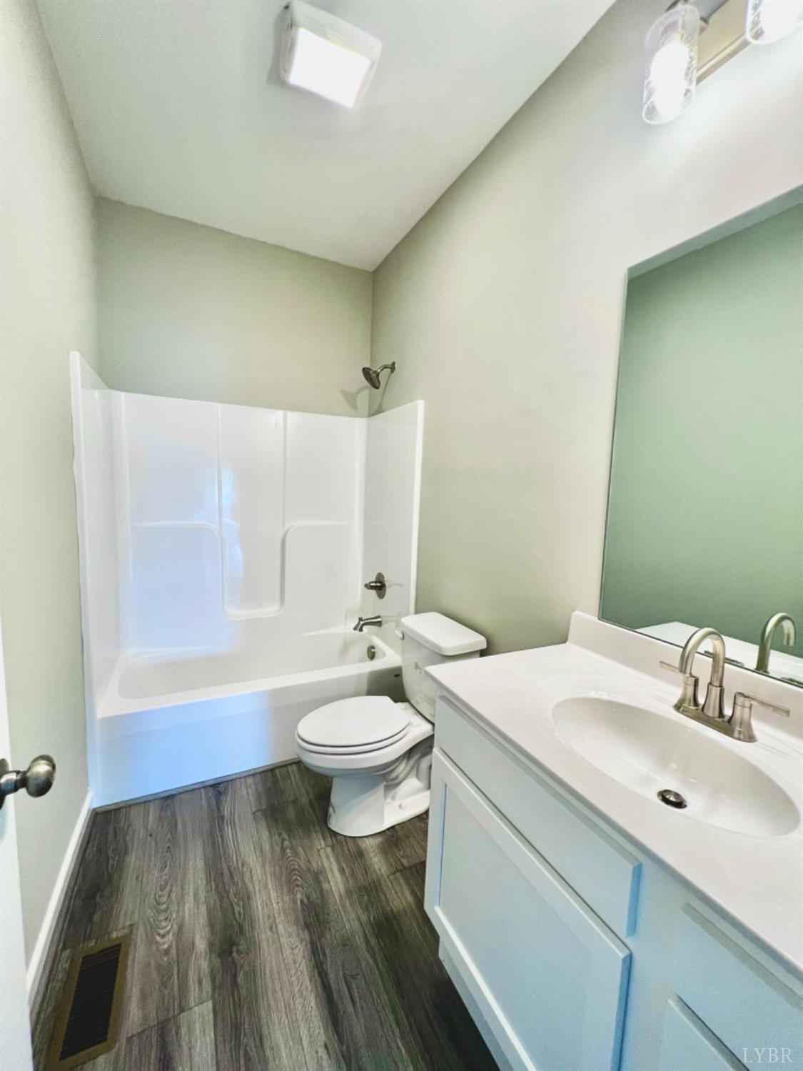 4922 Worsham Road Green Bay, VA 23942 - Photo 13 of 15 a bathroom with a sink and a mirror
