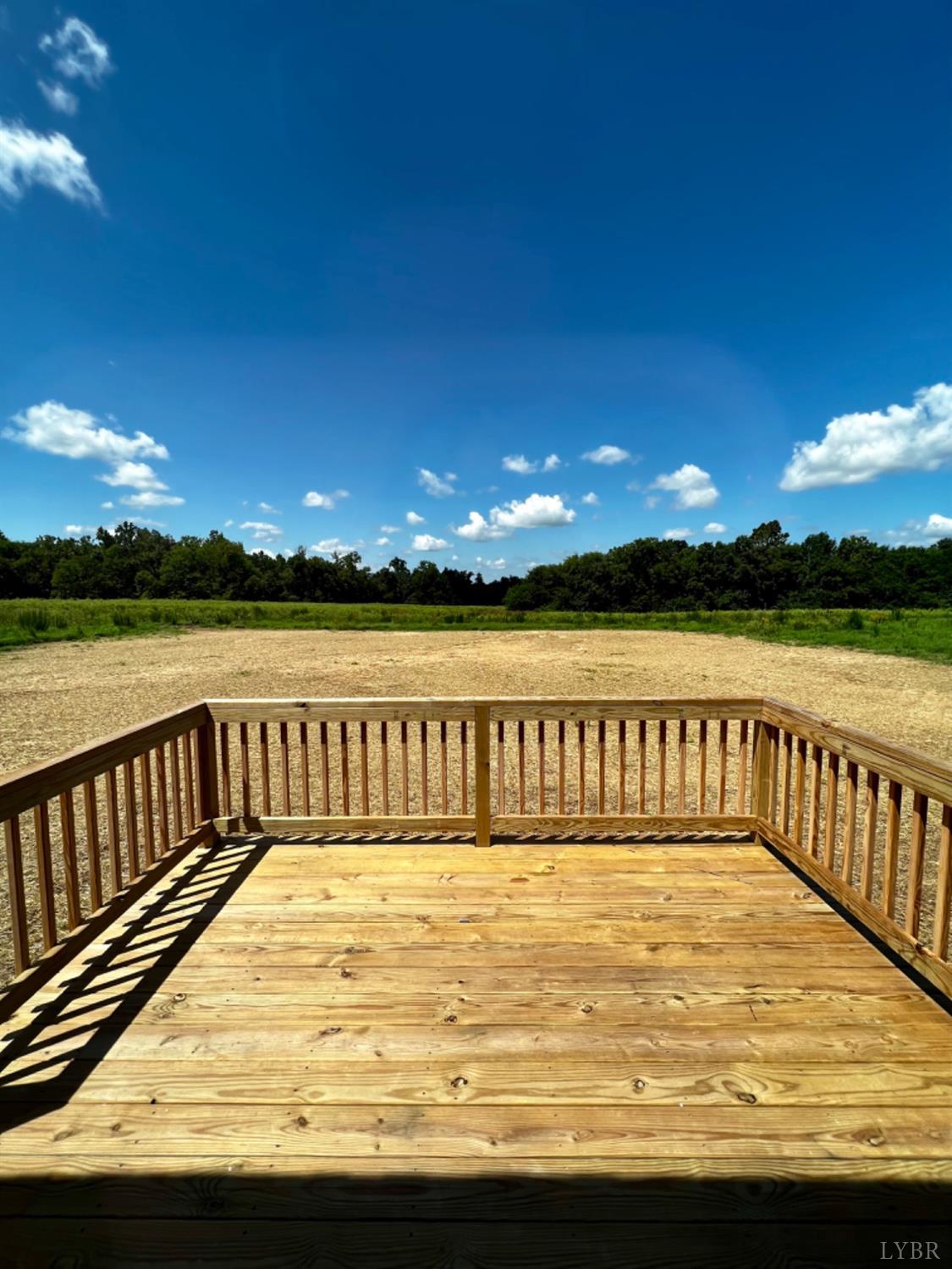 4922 Worsham Road Green Bay, VA 23942 - Photo 15 of 15 a view of swimming pool with a table under an umbrella