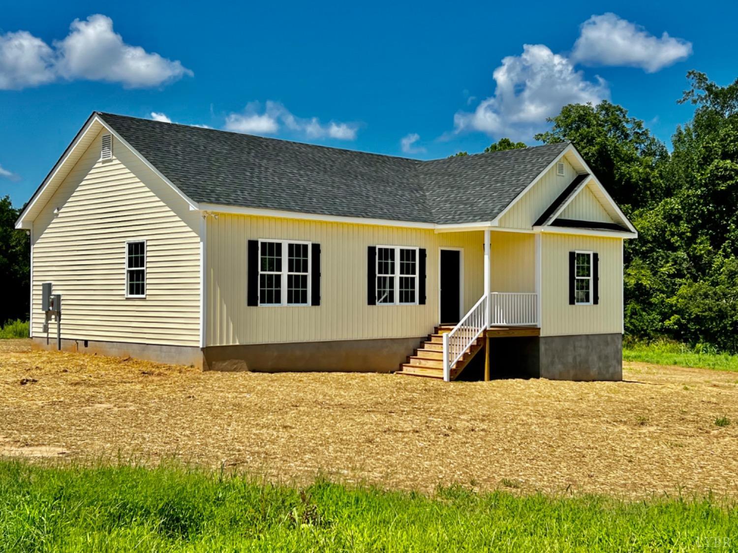 4922 Worsham Road Green Bay, VA 23942 - Photo 3 of 15 a front view of a house with a yard