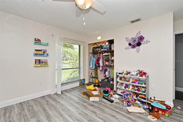 a bathroom with a sink mirror toilet and bathtub