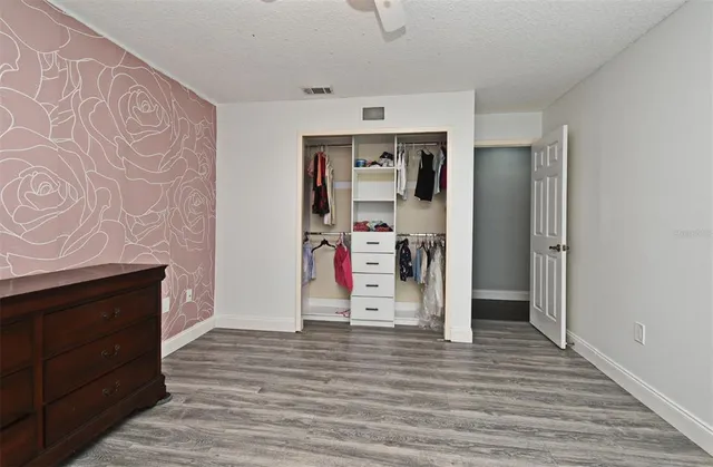 a view of a livingroom with a ceiling fan
