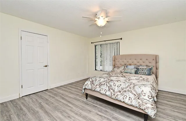 a view of a backyard with a small swimming pool