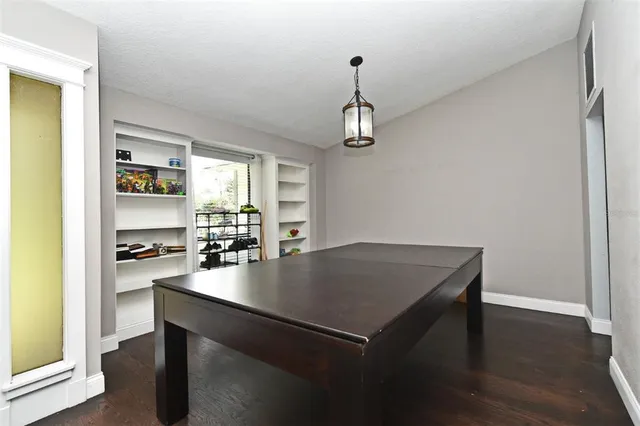 a view of a center island and living room