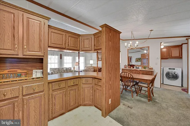 a bedroom with a bed lamp and window