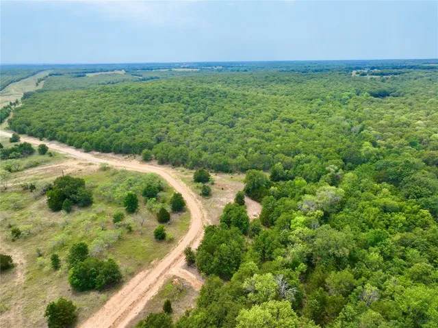 a view of an ocean and a yard