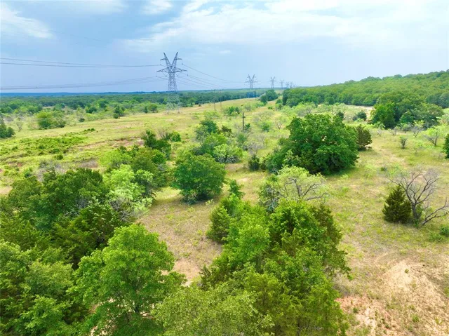 a view of a lake with a big yard