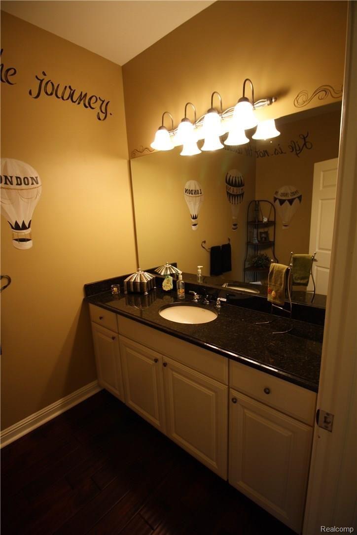 48167 Inveraray Road Canton, MI 48188 - Photo 28 of 37 Powder room with granite tops.
