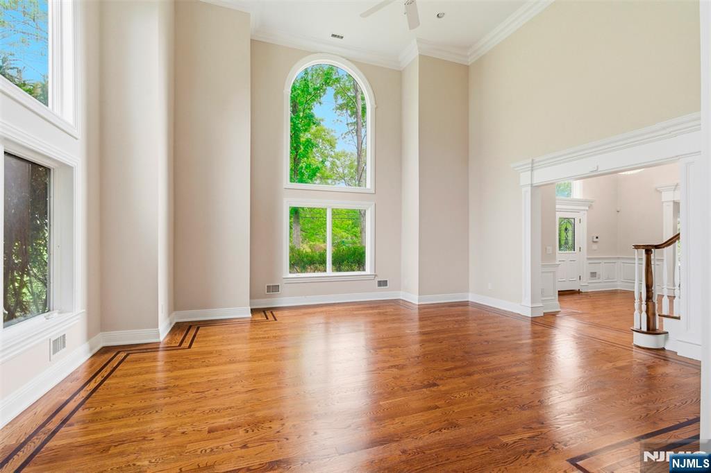 767 Orangeburgh Road River Vale, NJ 07675 - Photo 8 of 49 a view of empty room with wooden floor and fan