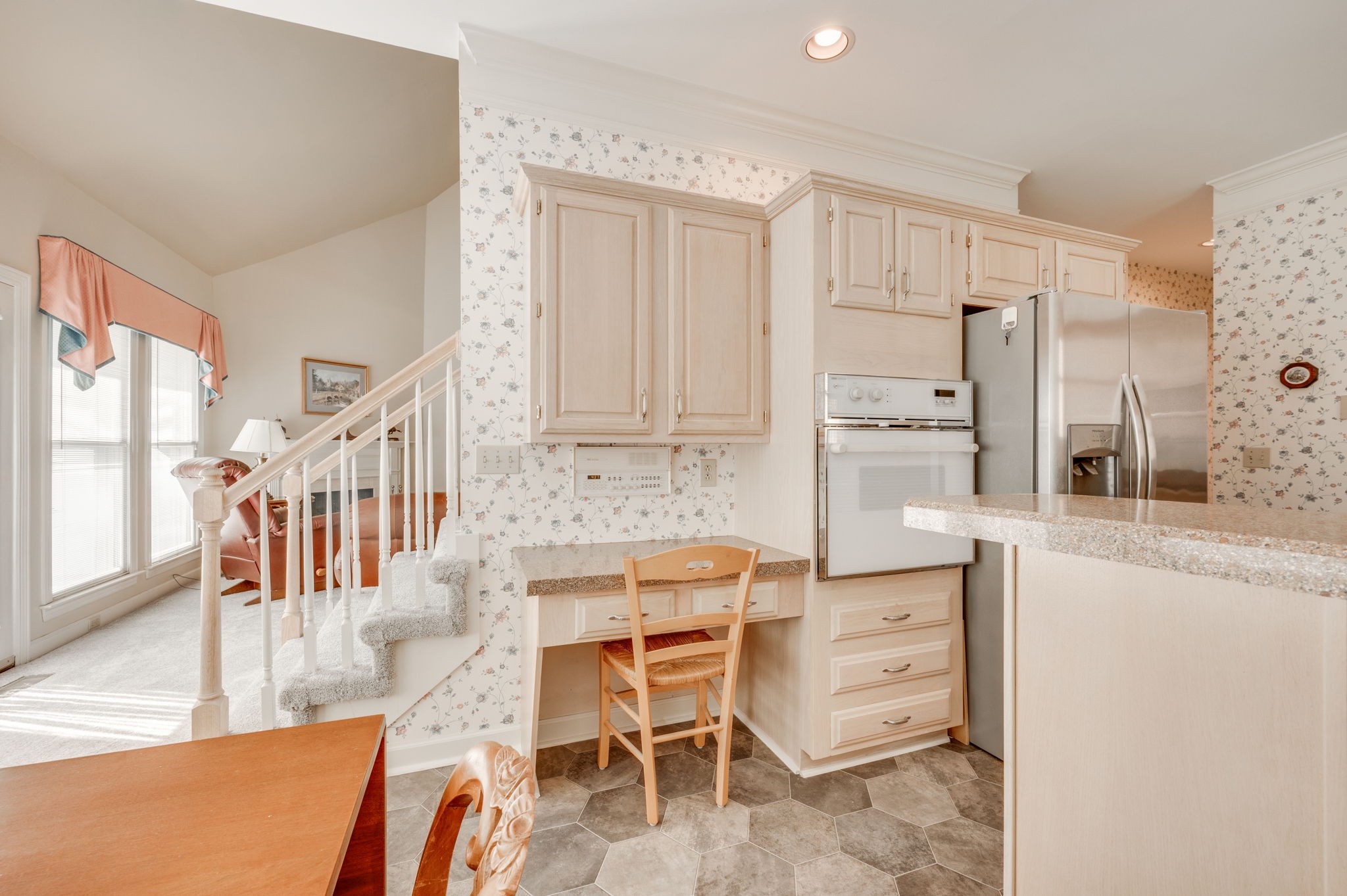 1705 Fieldcrest Circle Franklin, TN 37064 - Photo 12 of 45 a dining room with furniture and a kitchen view