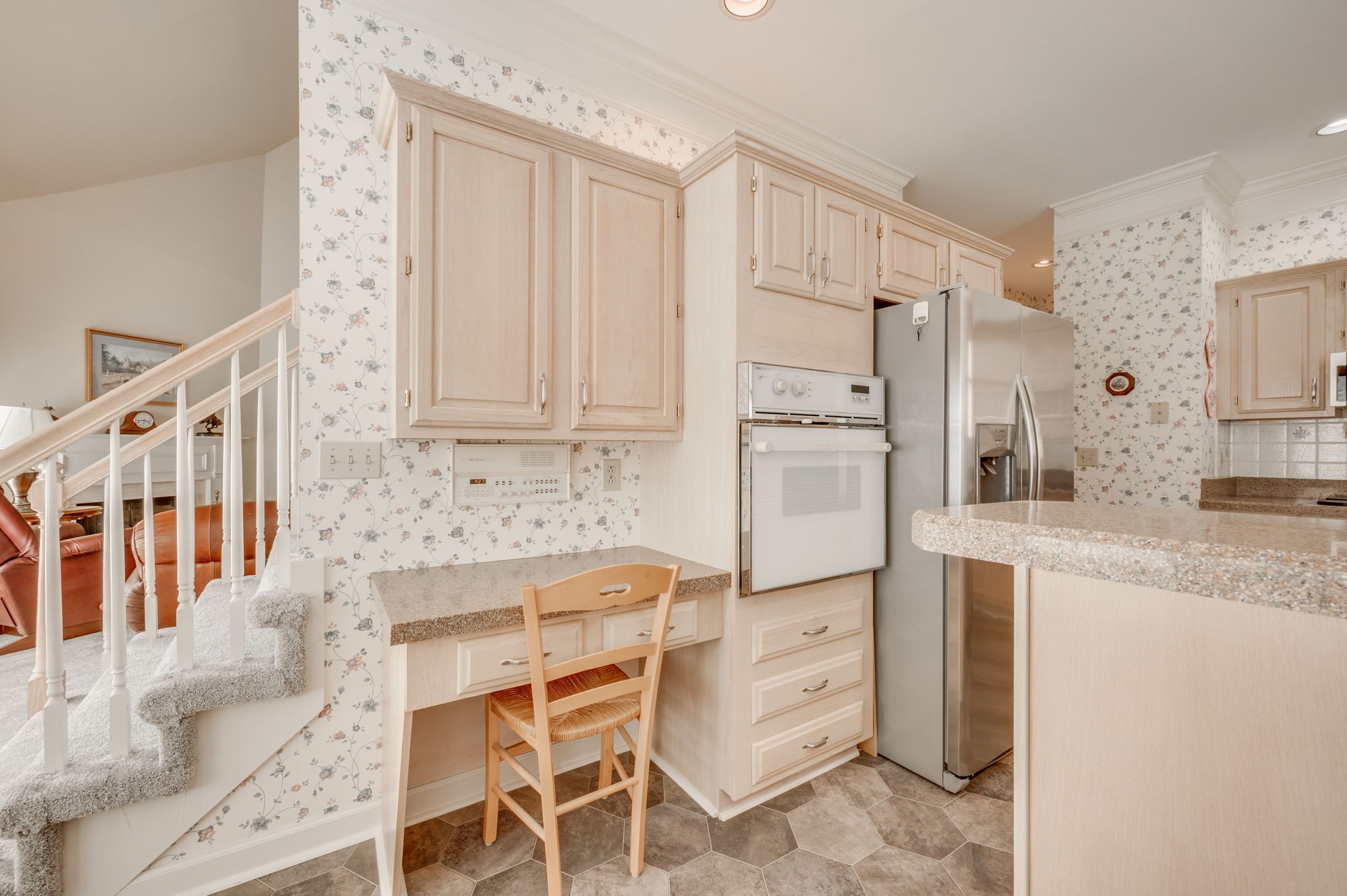 1705 Fieldcrest Circle Franklin, TN 37064 - Photo 14 of 45 a kitchen with granite countertop cabinets and refrigerator