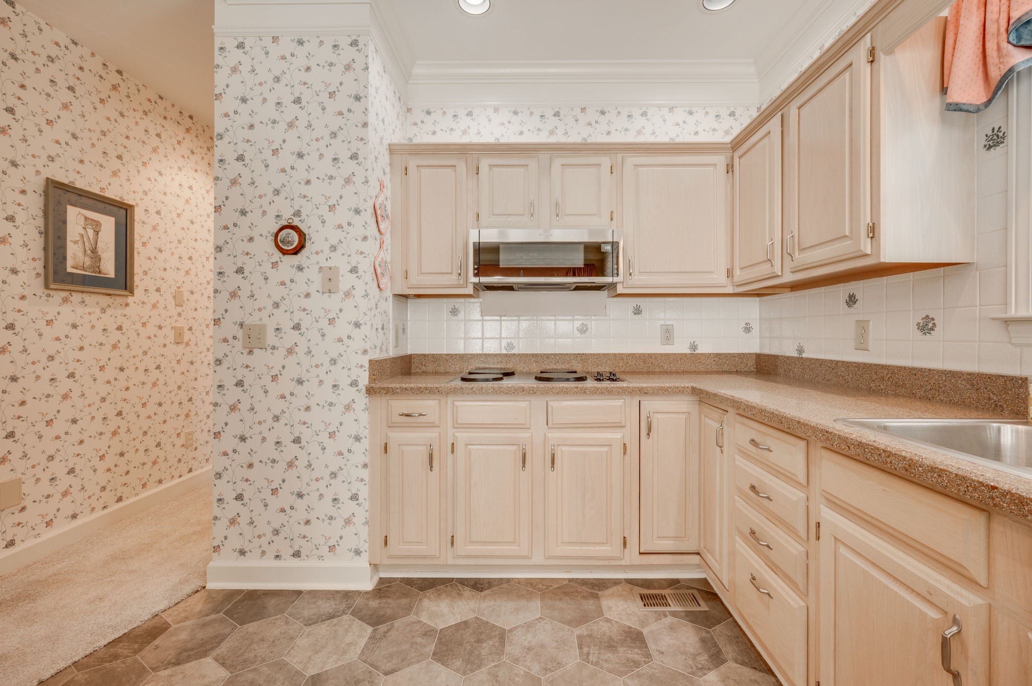 1705 Fieldcrest Circle Franklin, TN 37064 - Photo 16 of 45 a kitchen with stainless steel appliances granite countertop a sink and a stove