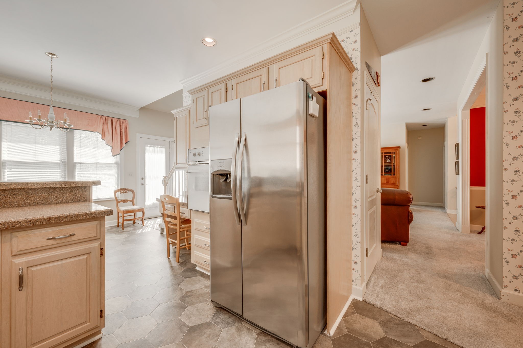 1705 Fieldcrest Circle Franklin, TN 37064 - Photo 18 of 45 a kitchen with stainless steel appliances a refrigerator sink and cabinets